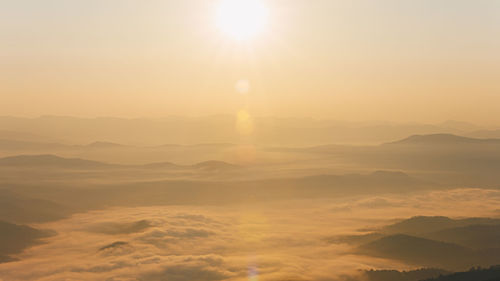 Scenic view of mountains against sky during sunset