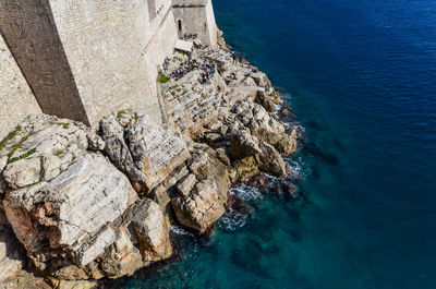 High angle view of rock formation in sea