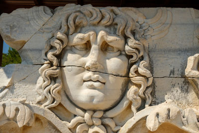 Low angle view of angel sculpture