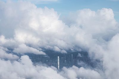 High angle view of cityscape covered with clouds