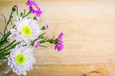 Close-up of purple flowers on table