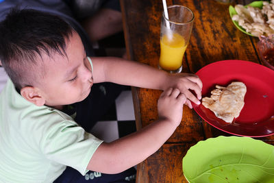 Boy will eat food at home