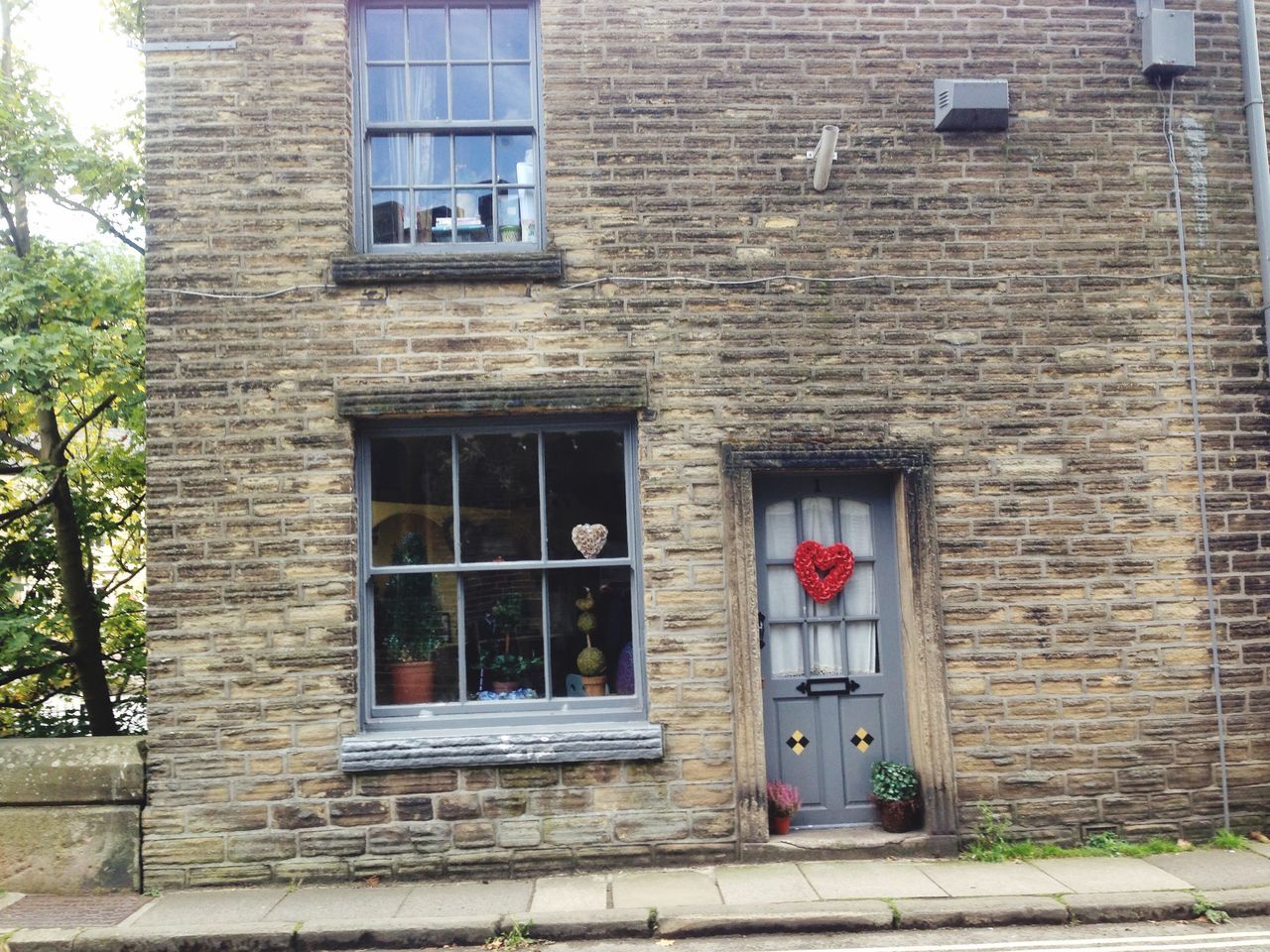 building exterior, architecture, built structure, window, brick wall, door, closed, house, residential structure, residential building, building, facade, entrance, day, wall - building feature, outdoors, old, wall, exterior, no people