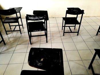 Chairs and table on tiled floor