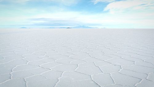 Scenic view of salar de uyuni against sky