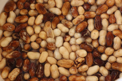 Full frame shot of peanuts in water