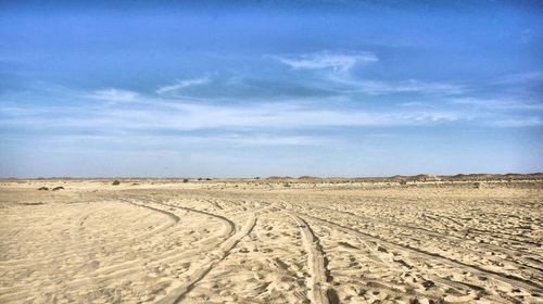 Scenic view of desert against sky