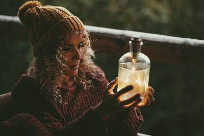 Close-up of woman drinking glass