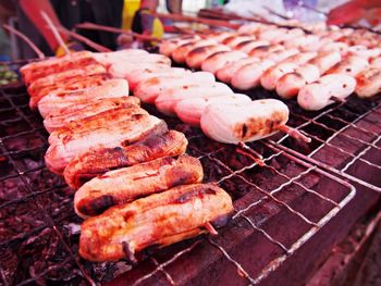 Close-up of meat on barbecue grill