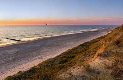 Scenic view of beach during sunset