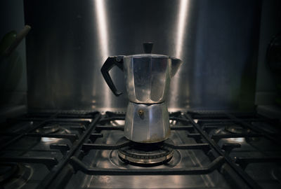 Close-up of coffee cups on table at home