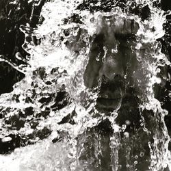 Close-up of water splashing in sea