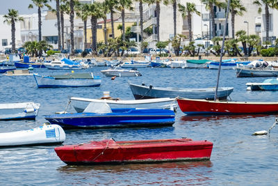 Boats moored on sea