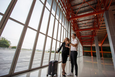 Business colleagues standing at airport