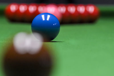 Close-up of pool balls on table