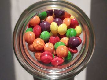 High angle view of candies in container