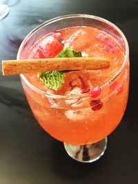 Close-up of orange juice on table