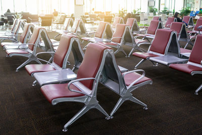 Empty seats in the departure lounge at the airport. tourism and departure concept.