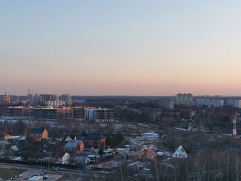 High angle view of buildings against sky during sunset