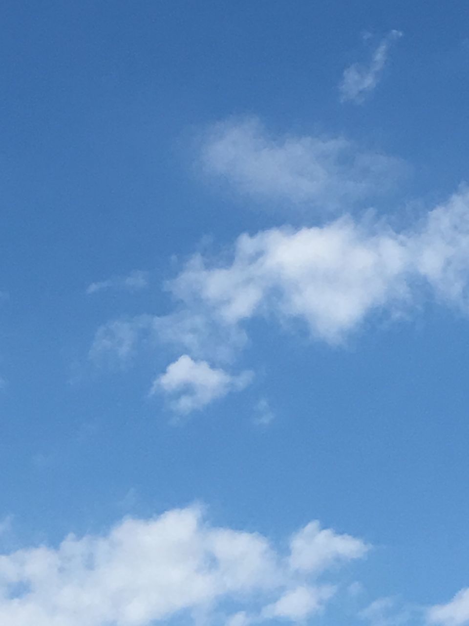 blue, low angle view, sky, beauty in nature, tranquility, scenics, tranquil scene, backgrounds, nature, cloud - sky, majestic, sky only, cloud, day, full frame, heaven, cloudscape, meteorology, outdoors, ethereal, dreamlike, no people