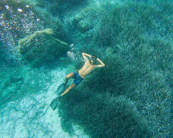High angle view of person swimming in sea