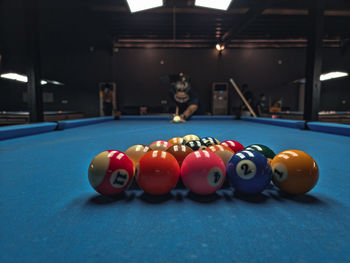 Multi colored balls on pool table