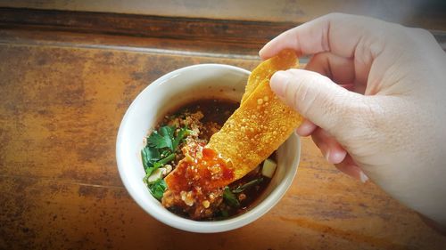 Close-up of hand holding food