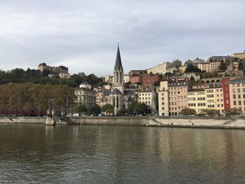 The saint-georges roman catholic church, the paul couturier bridge and quays of the saône river