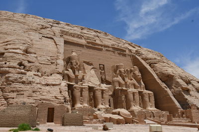 Statue of historic temple against sky