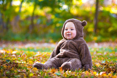 Portrait of a smiling boy in autumn