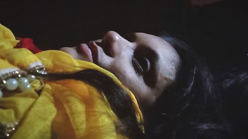 Close-up of a woman laying down