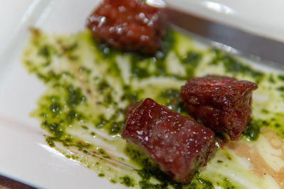 Close-up of served food in plate