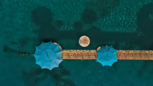 High angle view of people swimming in pool