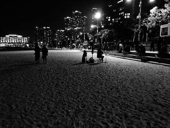 View of people in city at night