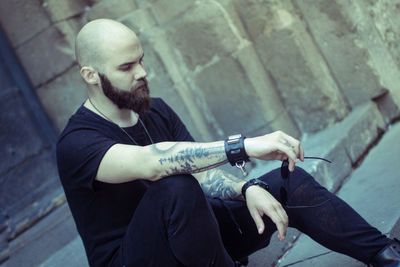 High angle view of man looking at camera