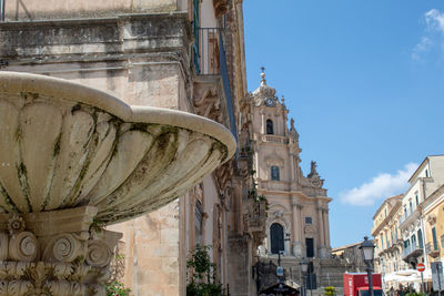 The fountain in the square in front of the cathedral of ragusa ibla