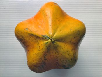 Close-up of fruit against white background