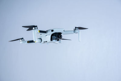 Low angle view of airplane against clear sky