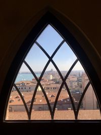 Buildings seen through glass window