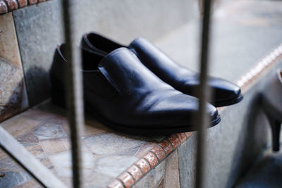 Low section of person sitting on seat