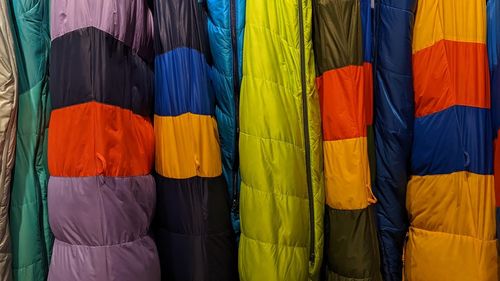 Full frame shot of multi colored clothes hanging for sale