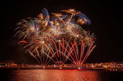 Firework display at night