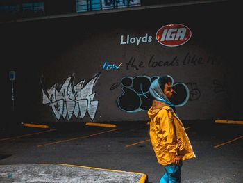 Man with text on graffiti