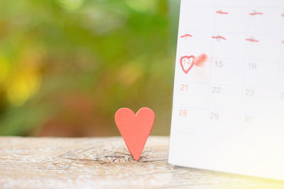 Close-up of heart shape on paper
