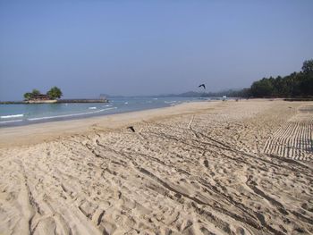 Scenic view of beach against clear sky