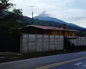 View of road against mountain range