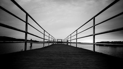 Empty pier over calm sea