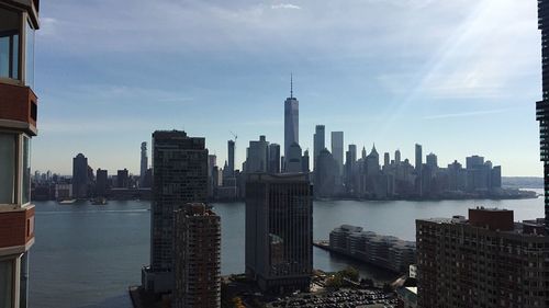 Modern buildings in city against sky