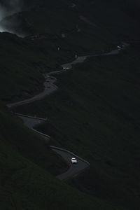 High angle view of winding road on land