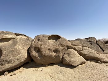 Rock formations against clear sky